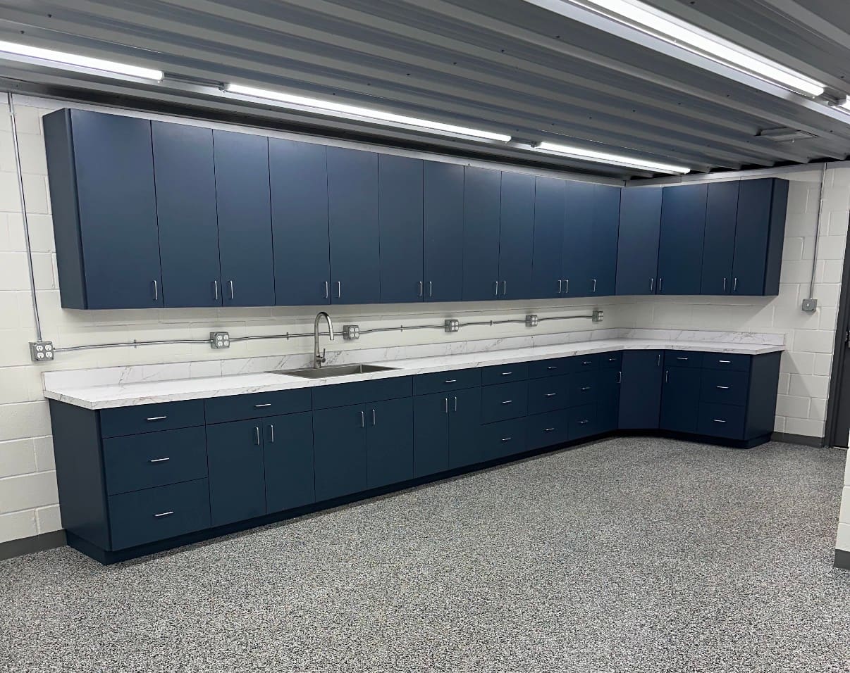 Becker Equine — navy commercial casework with marble countertops, Navasota, TX